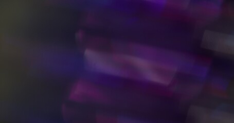Defocused light effect. Night glow. Blur blue purple colored lens flare on abstract art bokeh dark black abstract background.