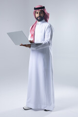 A collection of images of an Arab man wearing traditional Saudi thobe and shemagh, reflecting modern lifestyle activities like using technology, shopping, and standing confidently in a studio setting.