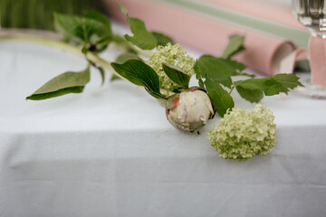 bouquet of flowers with wrapping paper on the table