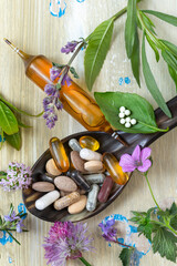 Beautifully arranged natural remedies on wooden