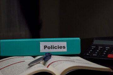 folders with the label Policies. Business management concept