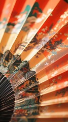 A detailed close-up of a classic Chinese fan adorned with bold and festive patterns. Vertical.
