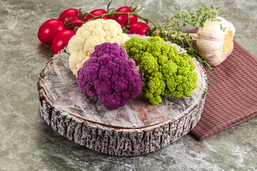 Raw cauliflower different colors heap