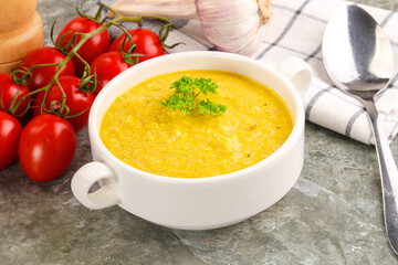 Vegetarian corn cream soup served parsley