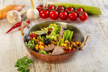 Dietary salad with canned tuna and corn