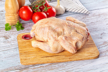 Raw whole uncooked organic chicken