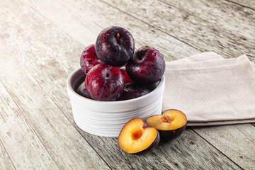 Ripe sweet juicy plum heap