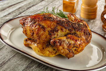 Baked in oven whole chicken with spices