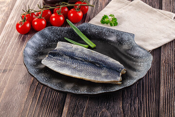 Salted herring fillet with skin