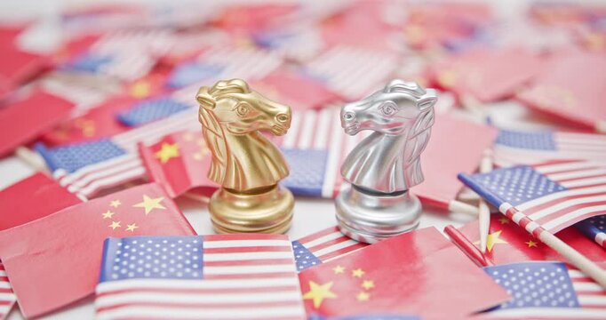 Golden and silver knight chess pieces represent the tactical competition between China and the US, surrounded by their respective flags, depicting the intricate trade negotiations, economic rivalries.