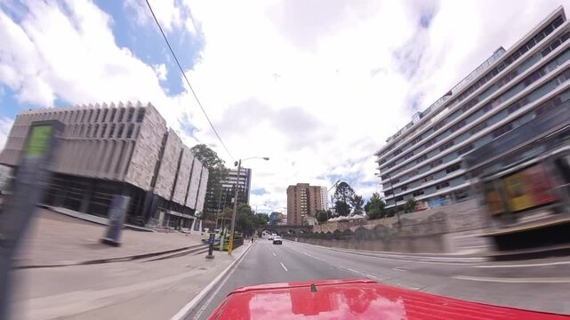 Antiguo Arco del Ferrocarril on 7ma Avenida, Zona 4 | filmed from moving car with dynamic truck-style motion and light blur