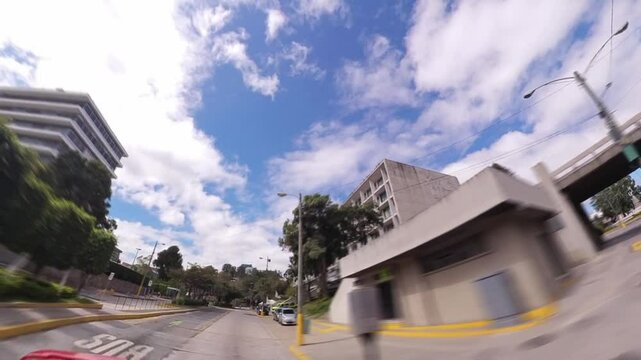Palacio Municipal and Municipalidad Building, Guatemala City &mdash; filmed from moving car with dynamic truck-style motion and subtle blur