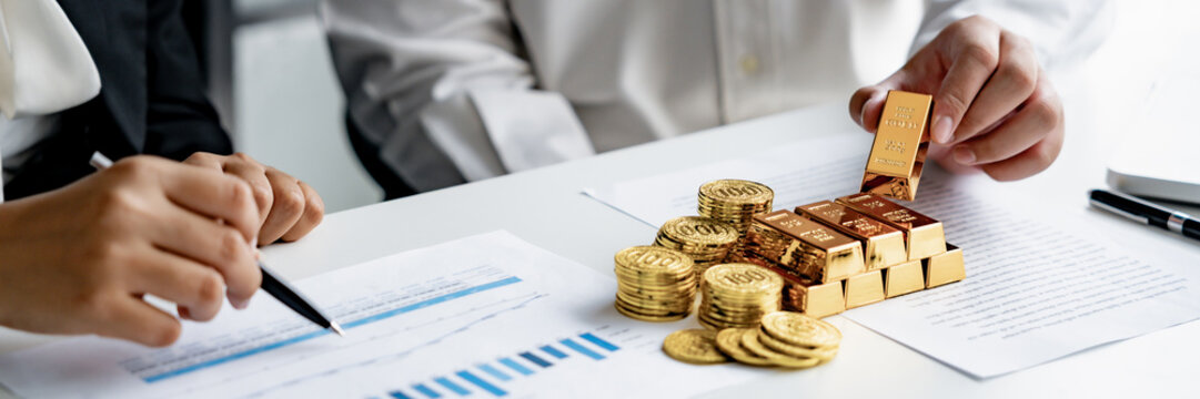 business partnership reviewing gold investment opportunities in financial market for mutual profit
