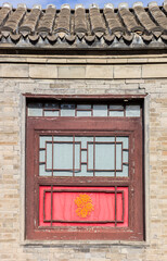Fototapeta premium Typical chinese window in a small house in Yangliuqing town in Tianjin, China