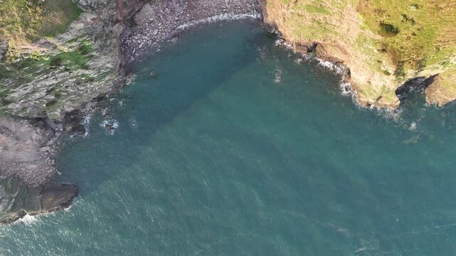 Drone shot of the Bristol Channel and North Devon coast from Combe Martin town