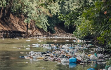 A view of a polluted river, Trash and waste in the river