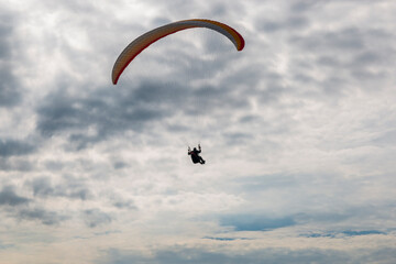 paragliding in the blue sky