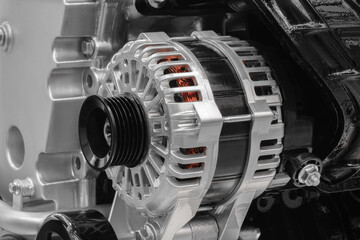 Electric current generator of the car is installed on the engine close-up