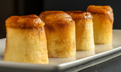 Close-up of piononos, traditional sweet pastries from Granada, Spain.