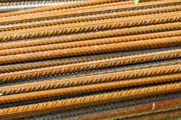 Close-up detail of steel reinforcement rebar showing textured surface and construction material quality