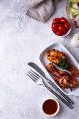 Roasted chicken drumsticks with vegetables