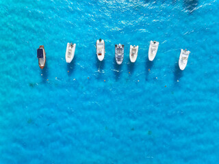 Vacation and leisure. Seascape with motorboat. Aerial view on fast boats on blue Mediterranean sea at sunny day. Fast ships on the sea surface. Seascape from the drone.