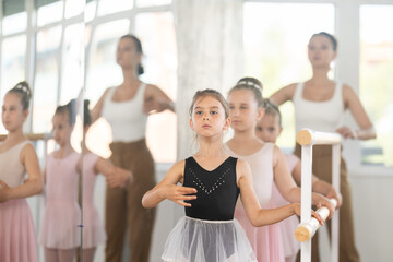 Group of ballerinas preparing for performance, learning and improving quality of rendering stage....
