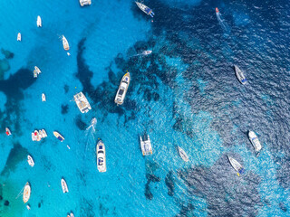Drone view of a motor boats and yacht. Luxury transportation. Vacationing people. Vacation and holidays. Summer time for sea travel.  Background, wallpaper, postcard.