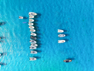 Vacation and leisure. Seascape with motorboat. Aerial view on fast boats on blue Mediterranean sea at sunny day. Fast ships on the sea surface. Seascape from the drone.