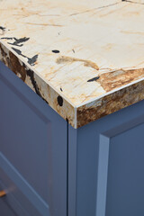 This is a stylish kitchen countertop featuring a unique edge design that stands out elegantly