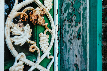 old painted door with decorative metal