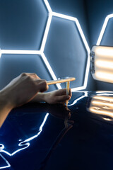 PDR Advanced technique in paintless dent removal restores finish. Precision tapping tool refines...