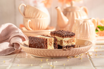 Delicious sponge cake with layer made of chocolate and cream.