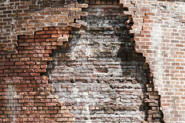 crumbling brick wall