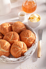 Homemade Kaiser buns with sesame , freshly baked.