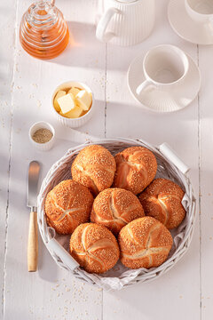 Tasty Kaiser buns with sesame , freshly baked.