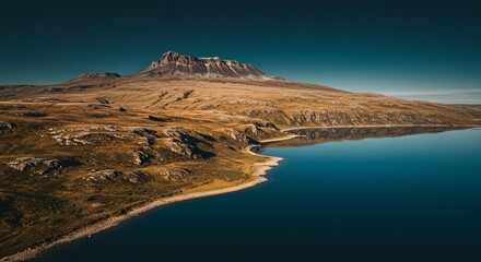 a mountain with a lake in the middle