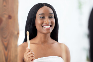 Dentistry, caries diseases prevention, personal hygiene concept. Cheerful millennial african...
