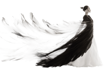 Dramatic feather cape blowing to the side worn by a striking fashion model standing confidently Isolated on Transparent Background PNG