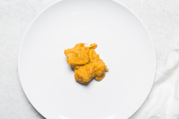 Overhead view of nigerian yam porridge, top view of nigerian asaro on a white background