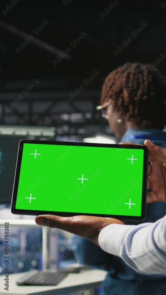 Poster vertical video close up of it experts using chroma key device to analyze neural networks outputs. da