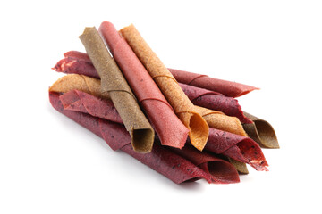 Delicious fruit leather rolls on white background