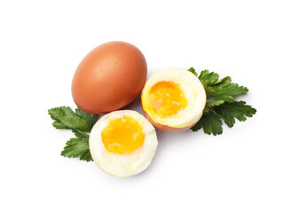Soft boiled eggs and parsley on white background, top view