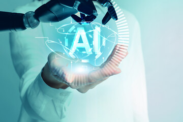 Robot hand and doctor with virtual AI abbreviation against background, closeup. Artificial...