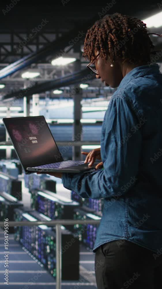 Poster vertical video data center software developer panicking after receiving critical error popup on lapt