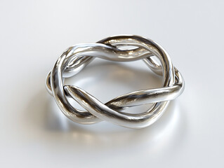 A puzzle ring, isolated on a white surface, with a tangled design and no shadow.