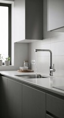 Modern kitchen with running water from sleek faucet, showcasing clean design and functional plumbing system