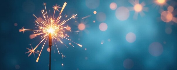 Obraz premium Minimalist sparkler burst on pastel blue, soft focus, minimal, festive