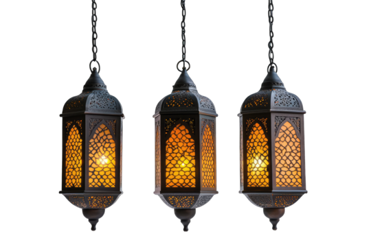 Three ornate, hanging lanterns with warm, glowing light emanating from within intricate, metallic designs against a black background