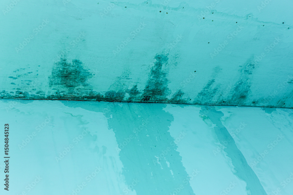 Poster close-up of a textured surface with an abstract pattern featuring shades of teal and blue, offering 